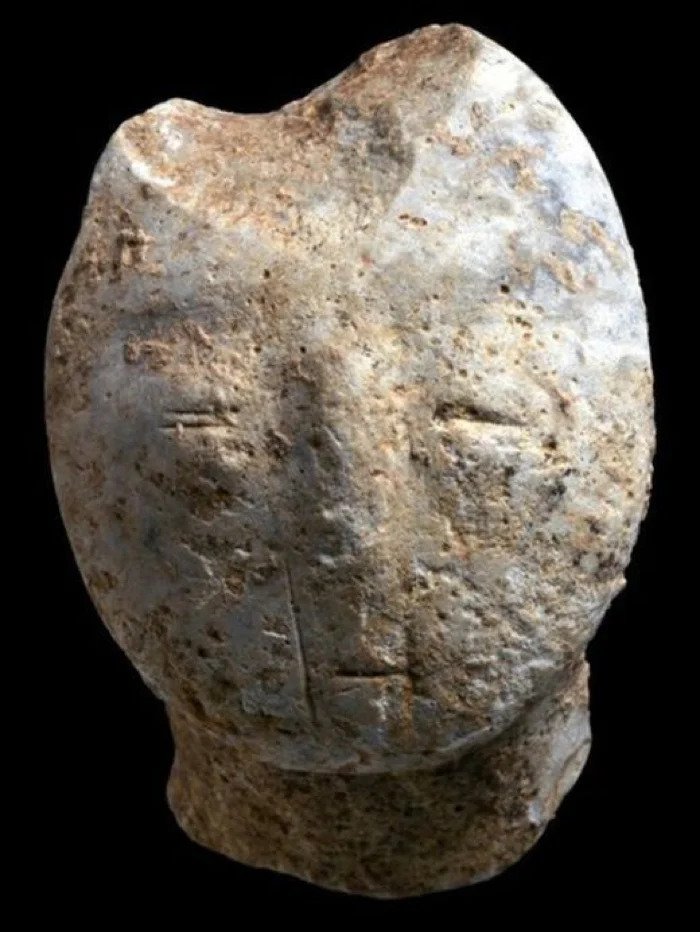 Carved human figure.