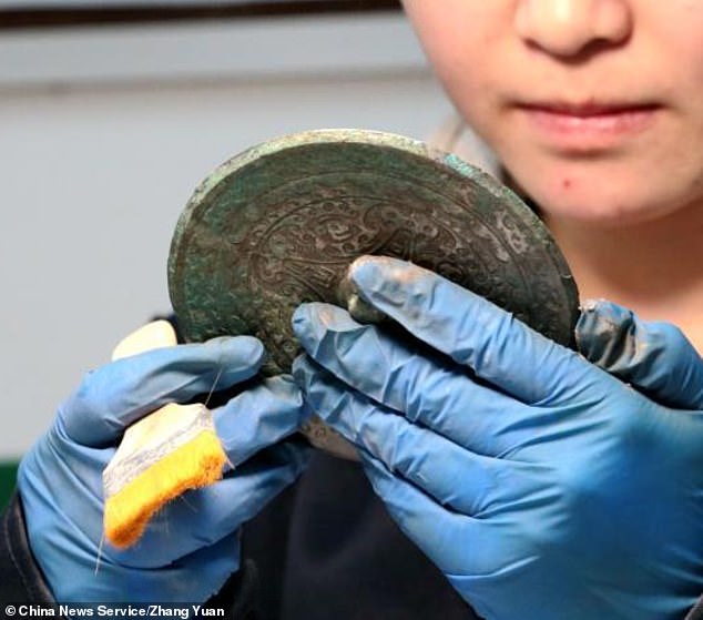 Trove of 2,000-Year-Old Bronze Mirrors Found in Ancient Chinese Cemetery