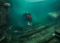 Egypt finds ancient military vessel, Greek graves in sunken city