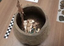 8 Jars Of Colombian Emeralds, Gold, and Silver Unearthed Near Bogotá