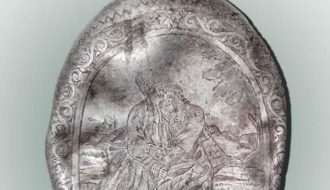 Romantic scene carved into a metal, Discovered 100 Years Later
