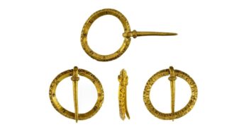 A unique gold brooch talisman with inscriptions in Latin and Hebrew was found in the UK