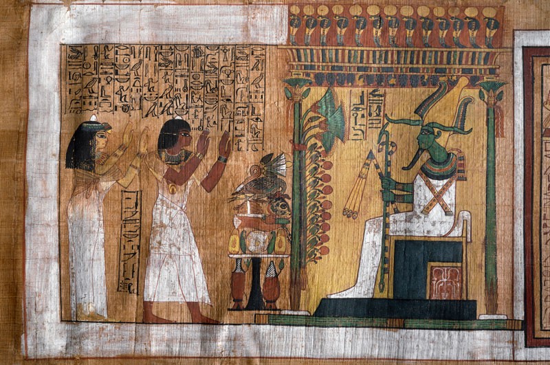 papyrus from from the tomb shows Kha and his wife Merit worshipping the lord of the afterlife, Osiris