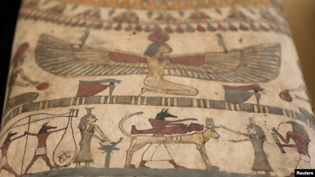 Paintings are seen on a sarcophagus that is around 2500 years old, from the newly discovered burial site near Egypt's Saqqara necropolis, during a presentation in Giza, Egypt, May 30, 2022.